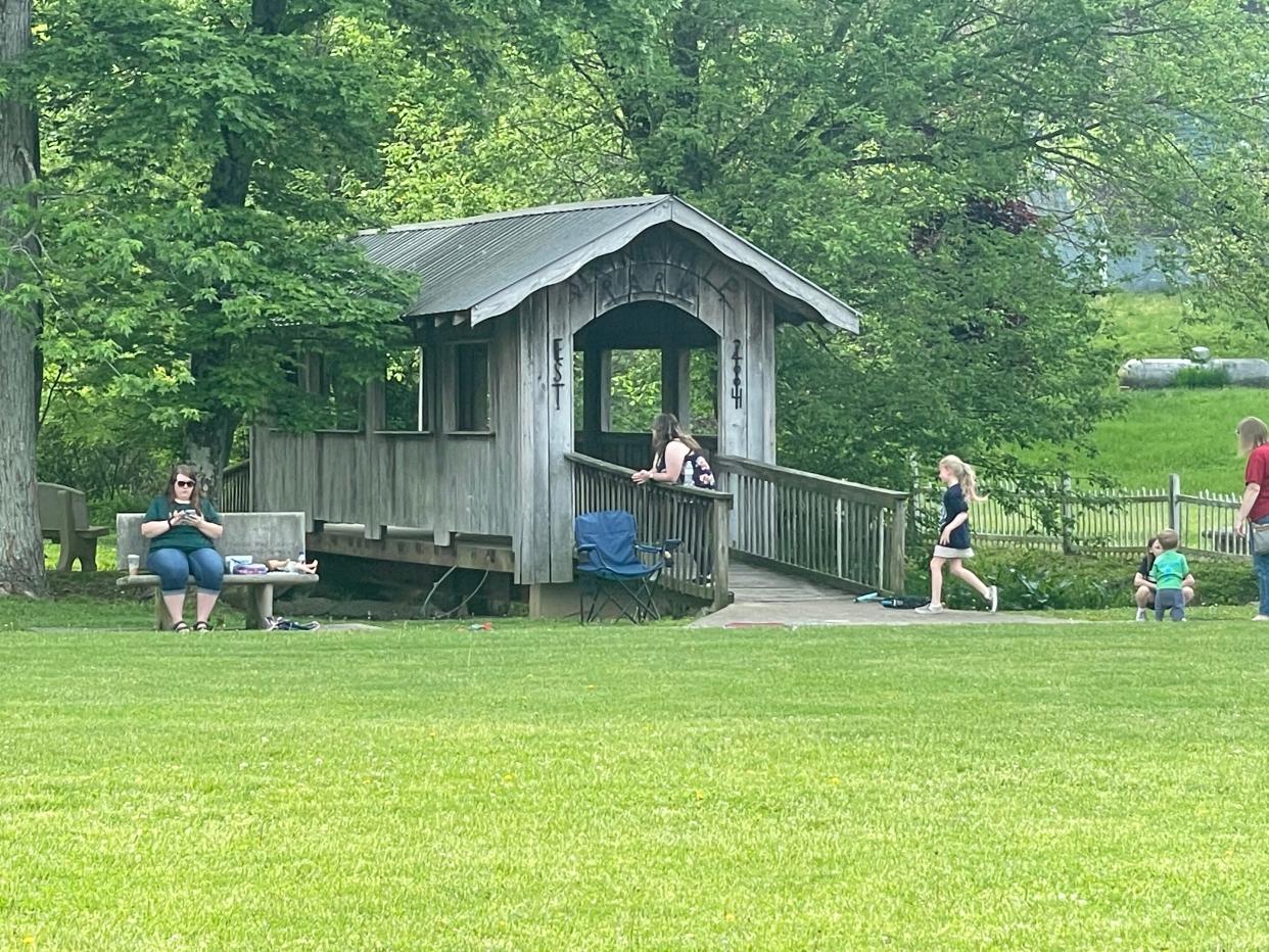 Springville Park has a playground and walking path, and a covered bridge was constructed across the reclaimed stream to a basketball court and a shelter house.