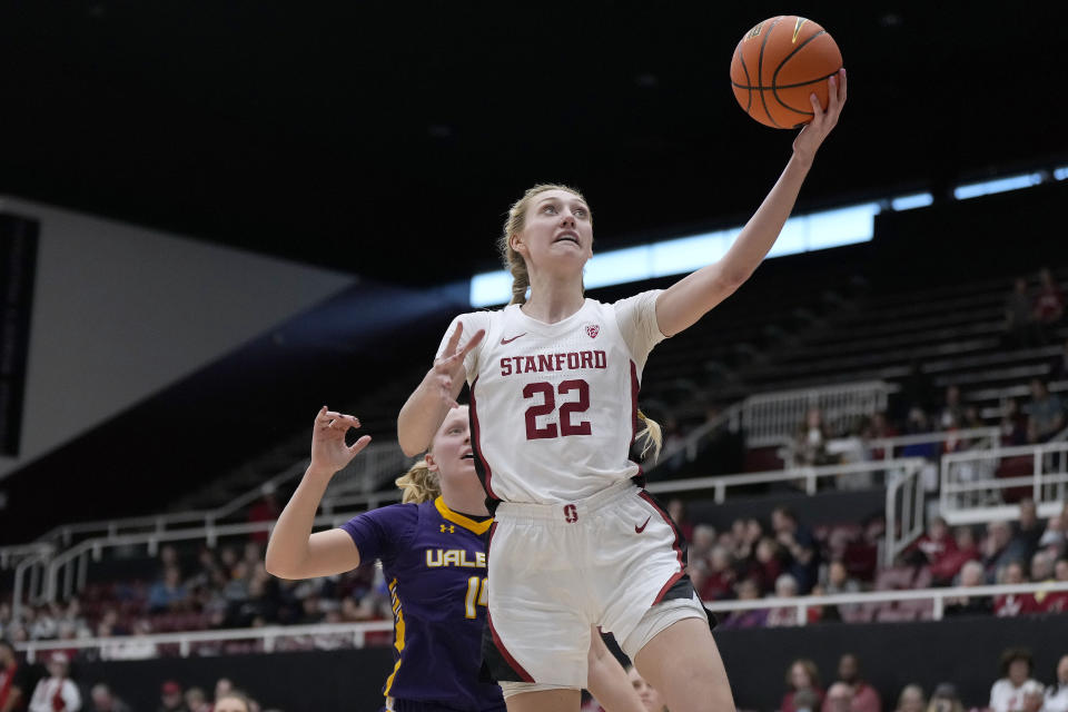 Stanford forward Cameron Brink drives to the basket past Albany forward Helene Haegerstrand during the second half of a game Nov. 26 in Stanford, California. (AP Photo/Tony Avelar)