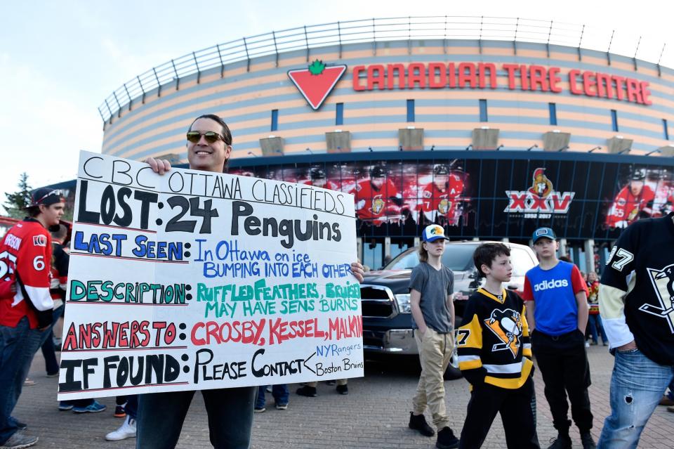 <p>An Ottawa Senators fan holds up a sign outside of the arena prior to Game Four of the Eastern Conference Final between the Ottawa Senators and the Pittsburgh Penguins during the 2017 NHL Stanley Cup Playoffs at Canadian Tire Centre on May 19, 2017 in Ottawa, Canada. (Photo by Minas Panagiotakis/Getty Images) </p>