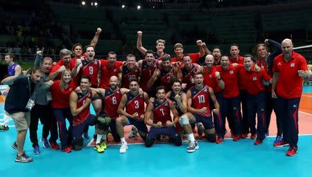 2016 Rio Olympics - Volleyball - Final - Men's Bronze Medal Match USA v Russia - Maracanazinho - Rio de Janeiro, Brazil - 21/08/2016. USA's (USA) team celebrates winning the match. REUTERS/Yves Herman