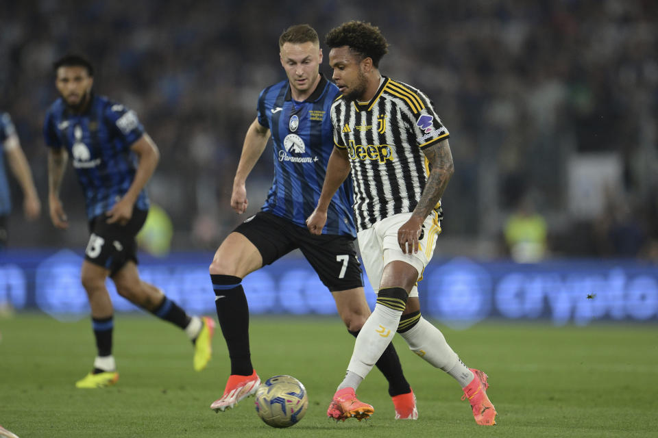 Juventus' Weston McKennie, front, plays the ball during the Italian Cup final soccer match between Atalanta and Juventus at Rome's Olympic Stadium, Wednesday, May 15, 2024. (Alfredo Falcone/LaPresse via AP)