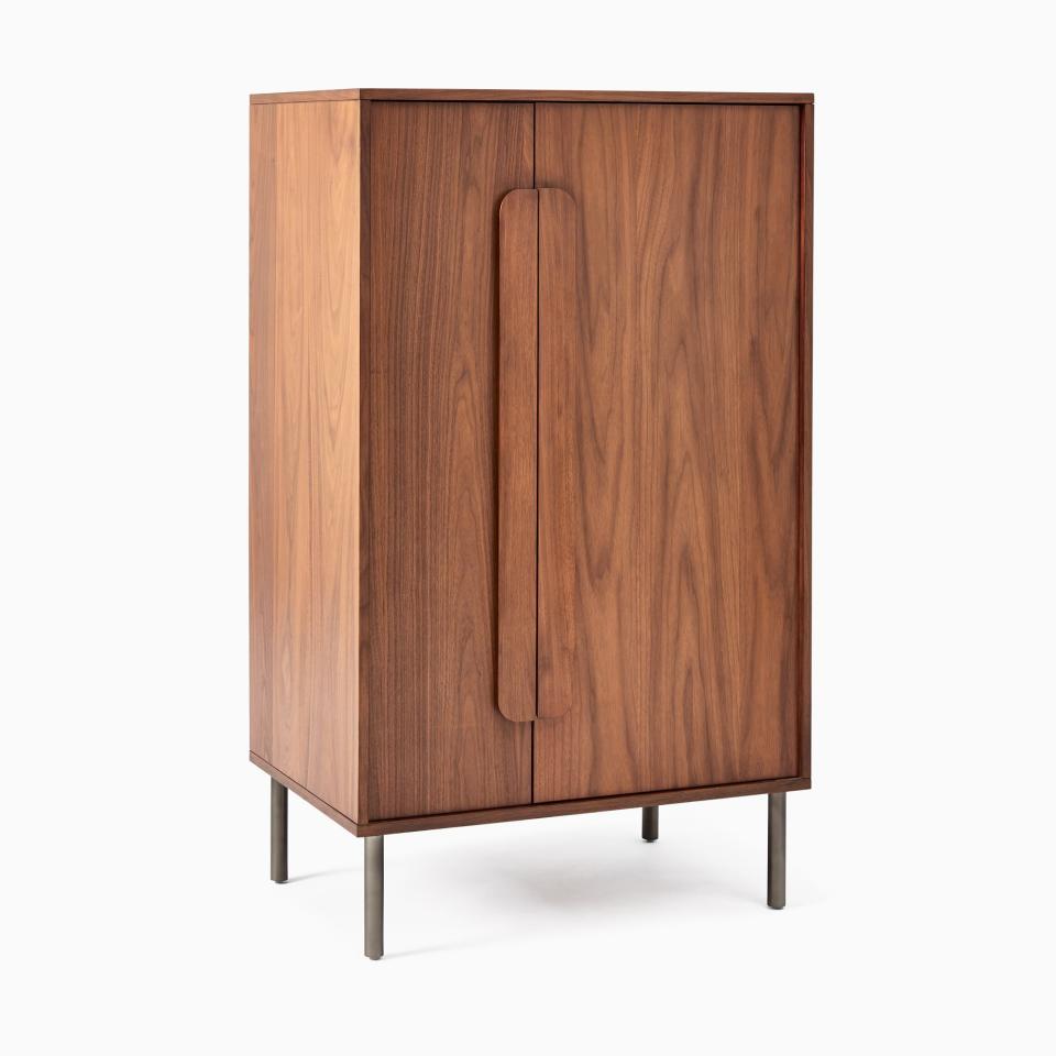 <p><a href="https://go.redirectingat.com?id=74968X1596630&url=https%3A%2F%2Fwww.westelm.com%2Fproducts%2Fgemini-armoire-walnut-h6819%2F&sref=https%3A%2F%2Fwww.womenshealthmag.com%2Flife%2Fg46455639%2Fhow-to-hide-ugly-stuff-in-your-home%2F" rel="nofollow noopener" target="_blank" data-ylk="slk:Shop Now;elm:context_link;itc:0;sec:content-canvas" class="link ">Shop Now</a></p><p>Gemini Armoire</p><p>westelm.com</p><p>$879.20</p>