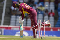 West Indies' Akeal Hosein is bowled by India's Arshdeep Singh during the first T20 cricket match at Brian Lara Cricket Academy in Tarouba, Trinidad and Tobago, Friday, July 29, 2022. (AP Photo/Ricardo Mazalan)