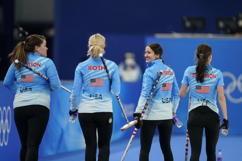 The United State's Tabitha Peterson turns to her teammates after a win against Russian Olympic Committee during a women's curling match at the Beijing Winter Olympics Thursday, Feb. 10, 2022, in Beijing. (AP Photo/Brynn Anderson)