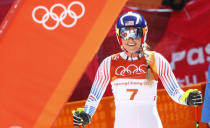 Lindsey Vonn of the U.S. reacts after her run in women's downhill alpine skiing. REUTERS/Kai Pfaffenbach