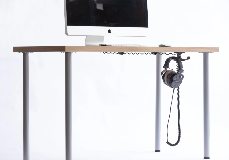 Keep your desk tidy and headphones handy with this genius hook. (Photo: Elevation Lab)