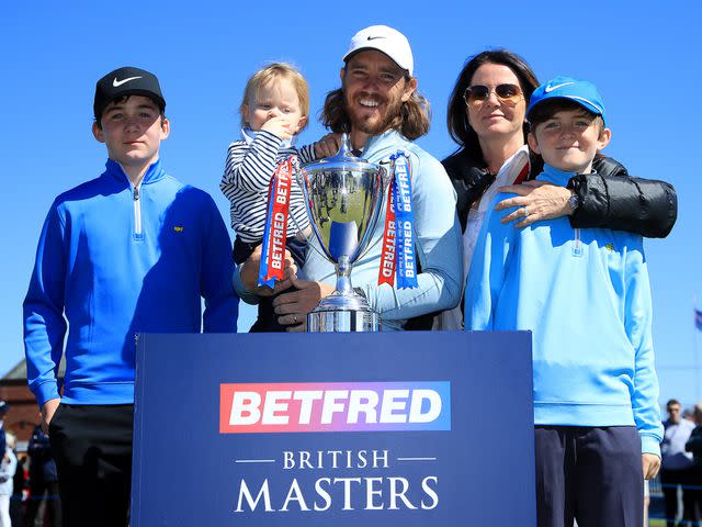 <p>Andrew Redington/Getty</p> Tommy Fleetwood with Clare Fleetwood and their children: Oscar Craig, Mo Craig and Franklin Fleetwood.