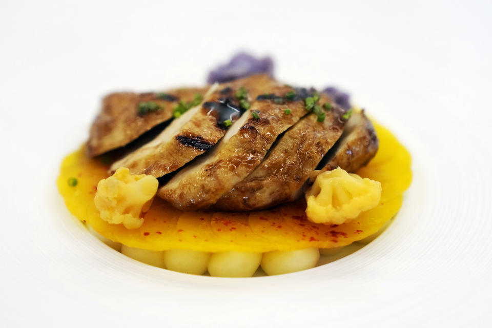 A prepared dish of Good Meat's cultivated chicken is shown at the Eat Just office in Alameda, Calif., Wednesday, June 14, 2023. The Agriculture Department issued final approvals Wednesday, June 21 to California firms Upside Foods and Good Meat to sell the products, known as “lab grown” or “cultivated” meat. (AP Photo/Jeff Chiu)