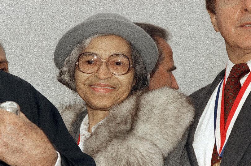 FILE - This Oct. 28, 1986 file photo shows Rosa Parks at Ellis Island in New York. The fight over Parks’ estate has her valuable mementos stuck in a New York City warehouse. Martin Luther King’s children are quarreling over who owns his Nobel Peace Prize and his Bible. Malcolm X’s heirs are suing to block a book deal to publicize his post-Mecca diary, an agreement brokered by one of their siblings.(AP Photo, File)