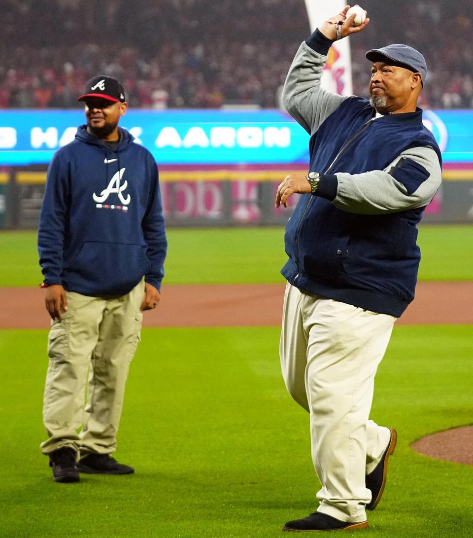 Hank Aaron Jr. throws out the ceremonial first pitch prior to Game 3 of the 2021 World Series between the Houston Astros and the Atlanta Braves at Truist Park on Friday, October 29, 2021 in Atlanta, Georgia.