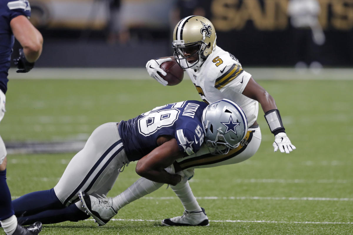 Rams exercise fifth-year option on defensive end Robert Quinn