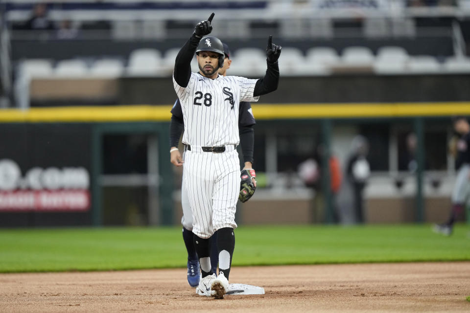 Chicago White Sox's Tommy Pham looks back at the dugout after his leadoff double off Cleveland Guardians starting pitcher Ben Lively during the first inning of a baseball game Thursday, May 9, 2024, in Chicago. (AP Photo/Charles Rex Arbogast)