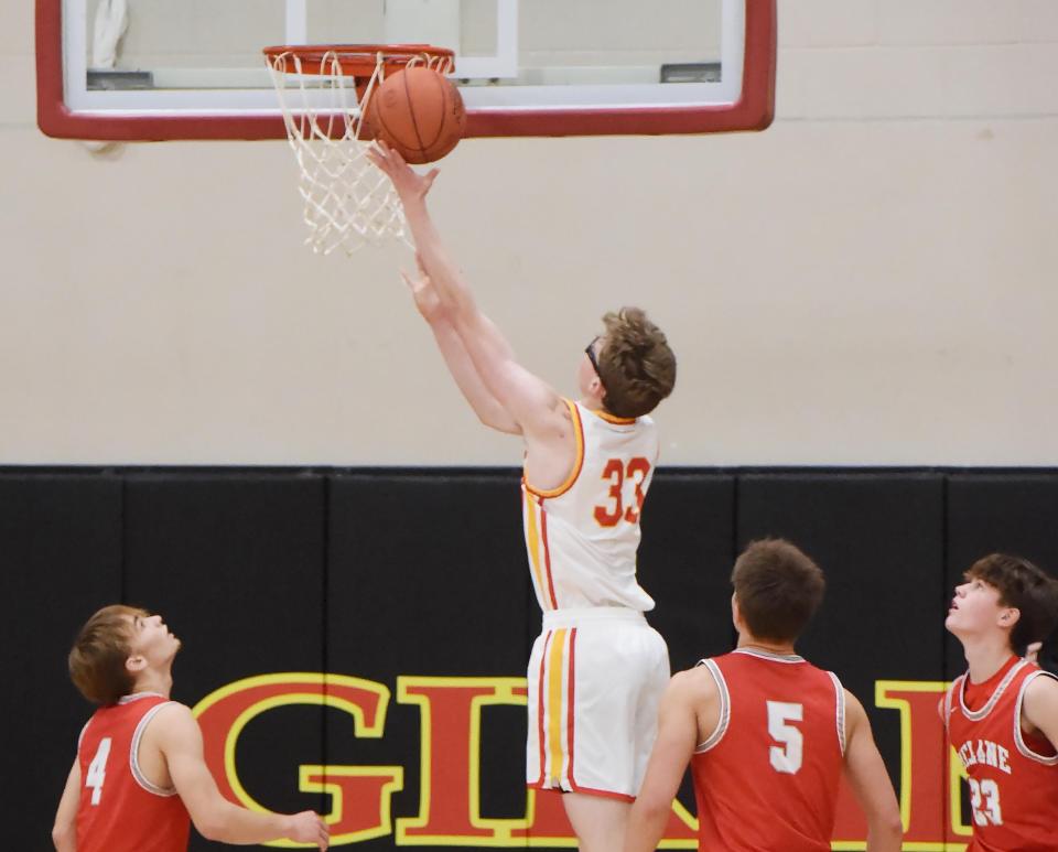 Girard High School senior Geremia Dell'Omo scores against General McLane during a boys basketball game in Girard on Dec. 5.