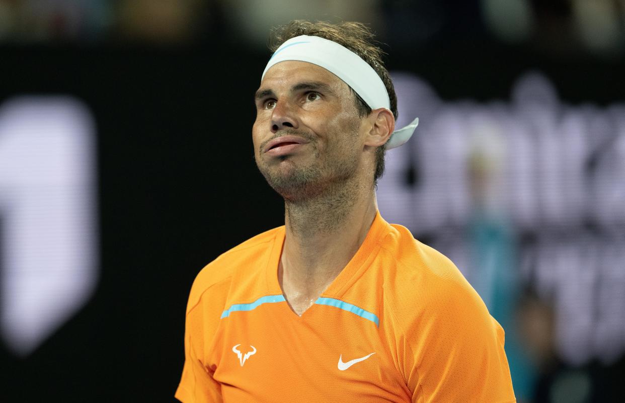 MELBOURNE, AUSTRALIA - JANUARY 18: Rafael Nadal of Spain reacts in their round two singles match against Mackenzie McDonald of the United States during day three of the 2023 Australian Open at Melbourne Park on January 18, 2023 in Melbourne, Australia. (Photo by Will Murray/Getty Images)