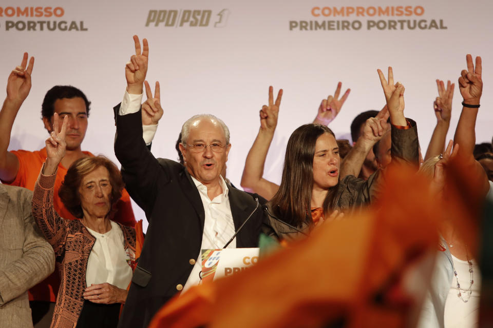 Rui Rio, leader of the Social Democratic Party, center, gestures during an election campaign rally in Lisbon Friday, Oct. 4, 2019. Portugal will hold a general election on Oct. 6 in which voters will choose members of the next Portuguese parliament. (AP Photo/Armando Franca)