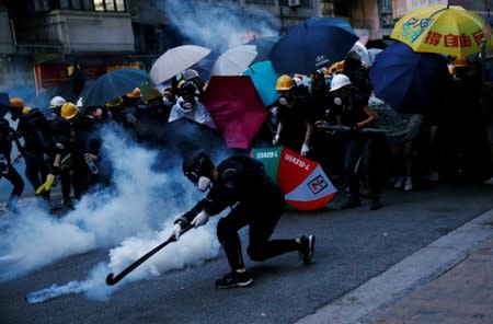 FILE PHOTO: Hong Kong democracy activists march in Hong Kong's Central and Western districts