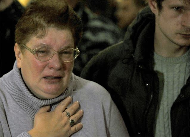 Relatives break down on hearing the news of their loved ones. Photo: AFP