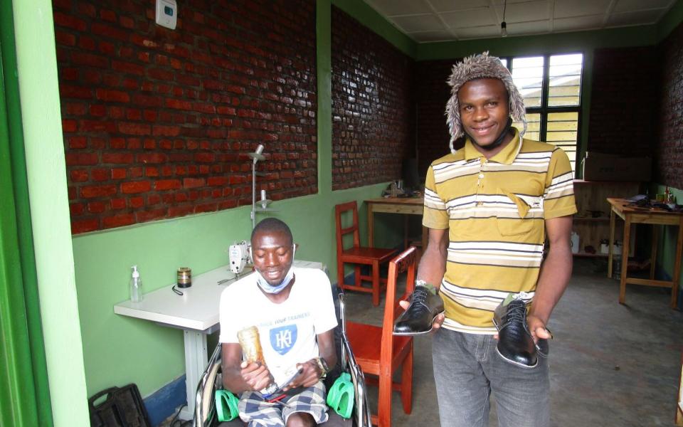 Shoemakers: Fidele, left, next to Obek, right