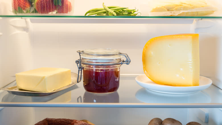 Various items on refrigerator shelves 