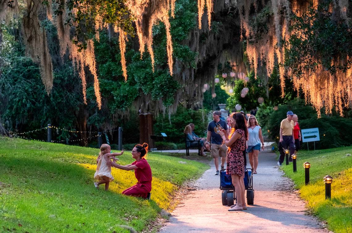 Brookgreen Gardens is holding it’s “Summer Light: Art by Night” events where visitors stroll the historic sculpture gardens under the glow of ten unique lighting installations. Live music is performed and food trucks offer local fare as the sun sets transforming the gardens. “Art by Night” is held on Wednesday and Saturdays from 6-10pm. Non-Member ticket prices are $25 for adults and $15 per child. May 18, 2022. JASON LEE/jlee@thesunnews.com