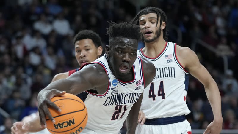 UConn’s Adama Sanogo (21) rebounds in the second half of a second-round game against Saint Mary’s in the NCAA Tournament, Sunday, March 19, 2023, in Albany, N.Y.