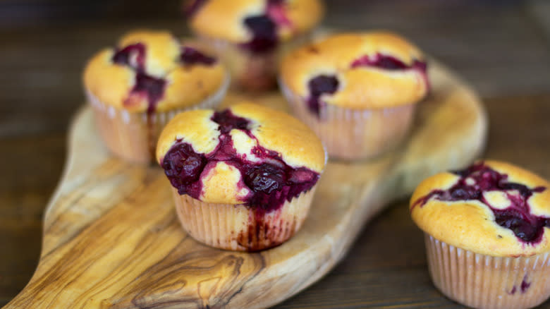 Muffins with fruit on board