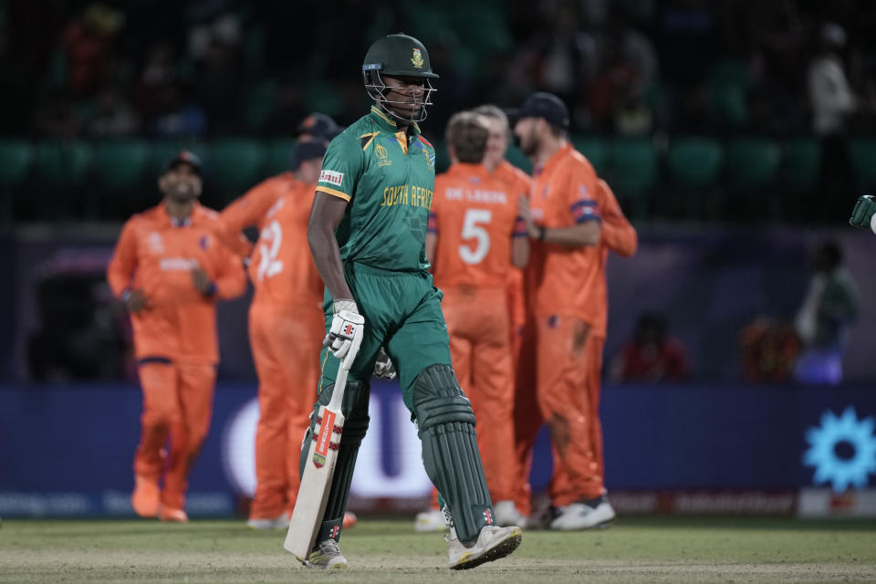 South Africa's Kagiso Rabada leaves the ground after being dismissed during the ICC Men's Cricket World Cup match between South Africa and Netherlands in Dharamshala, India, Tuesday, Oct. 17, 2023. (AP Photo/Ashwini Bhatia)