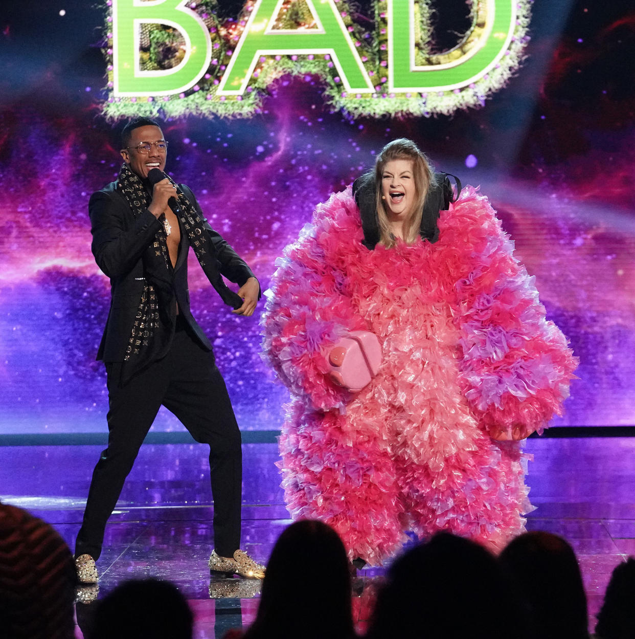 THE MASKED SINGER: L-R: Host Nick Cannon and Kirstie Alley in THE MASKED SINGER episode airing Wed. April 27 (8:00-9:00 PM ET/PT) on FOX. (Photo by FOX via Getty Images)