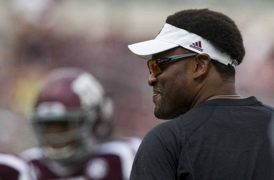 Texas A&M head coach Kevin Sumlin watches his team warmup before the start of an NCAA college football game against Louisiana-Lafayette Saturday, Sept. 16, 2017, in College Station, Texas. (AP Photo/Sam Craft)