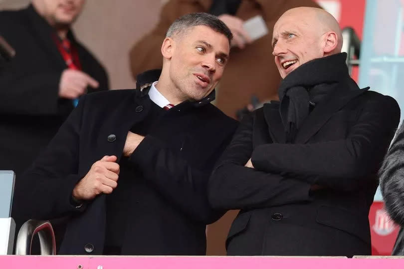 Stoke City joint-chairman John Coates watches from the stands next to interim technical director Jon Walters.