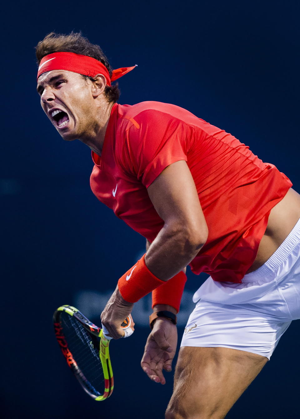 Rafael Nadal, of Spain, serves the ball against Marin Cilic, of Croatia, during quarterfinal men's Rogers Cup tennis action in Toronto, Friday, Aug. 10, 2018. (Nathan Denette/The Canadian Press via AP)