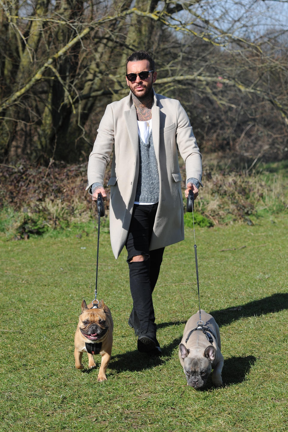 Pete Wicks and Megan Mckenna walk petes dogs as they film scenes for TOWIE.