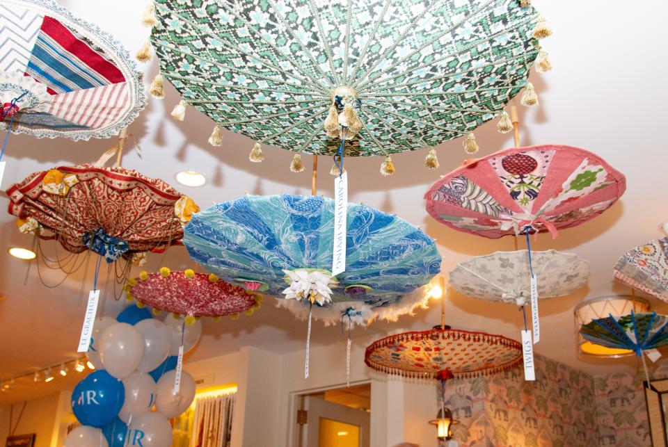 In addition to the tables, several John Rosselli vendors devised parasols in their respective fabrics, which hung from the ceiling, giving the carnival-themed event the true tented feel it needed.