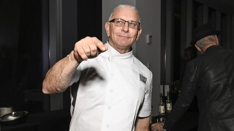 Chef Robert Irvine pointing