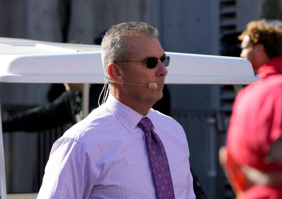 Former Ohio State coach Urban Meyer is now an analyst for Fox. Here he walks to the Big Noon Kickoff show set before Buckeyes hosted Penn State.