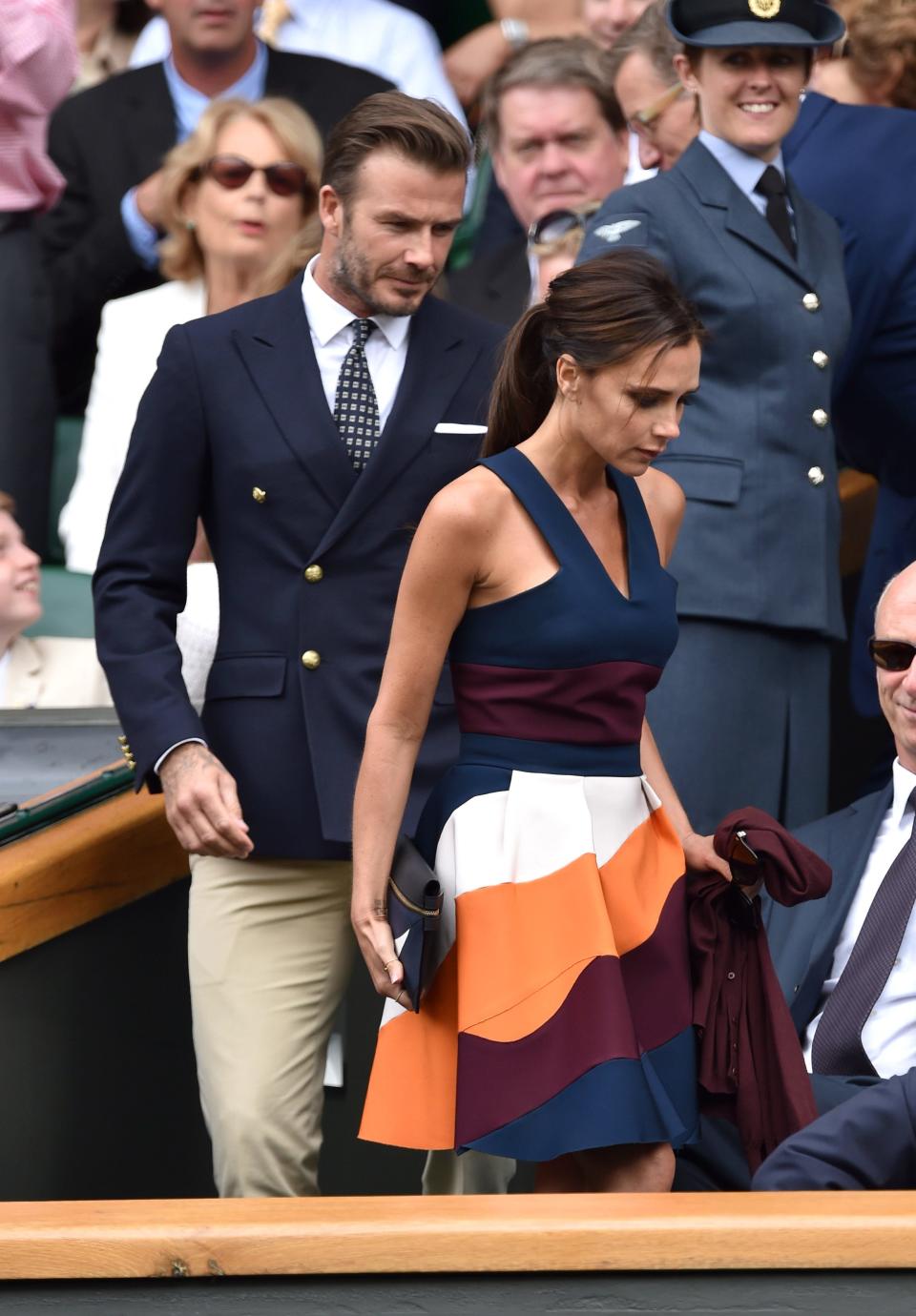 David Beckham and Victoria Beckham at Wimbledon on July 6, 2014 in London, England.