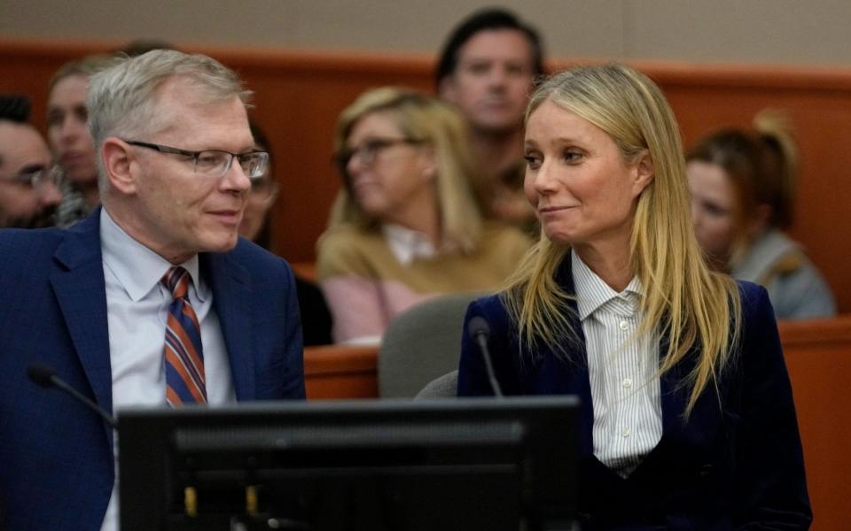 Gwyneth Paltrow and her lawyer Steve Owens smile after the reading of the verdict in the trial over her 2016 ski collision with 76-year-old Terry Sanderson on Thursday, the final day of her eight-day trial in Park City, Utah - Rick Bowmer/POOL/EPA-EFE/Shutterstock