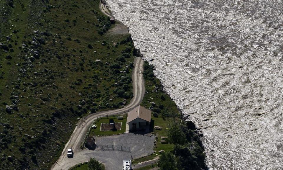 A road ends where flood waters washed away a house in Gardiner, Montana, in June.