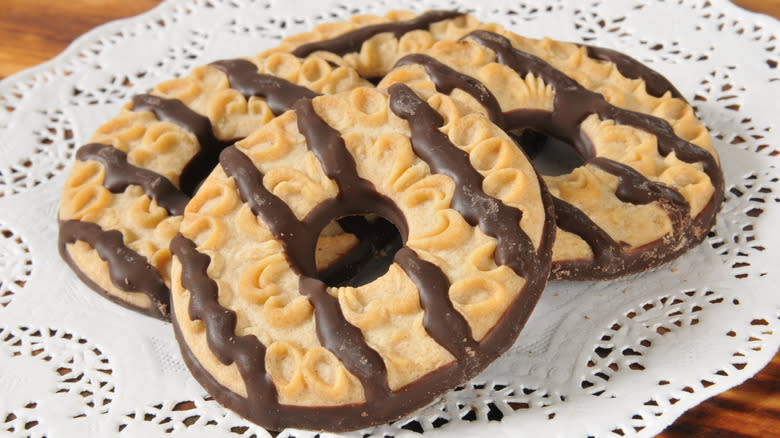 Fudge-striped cookies on a doily