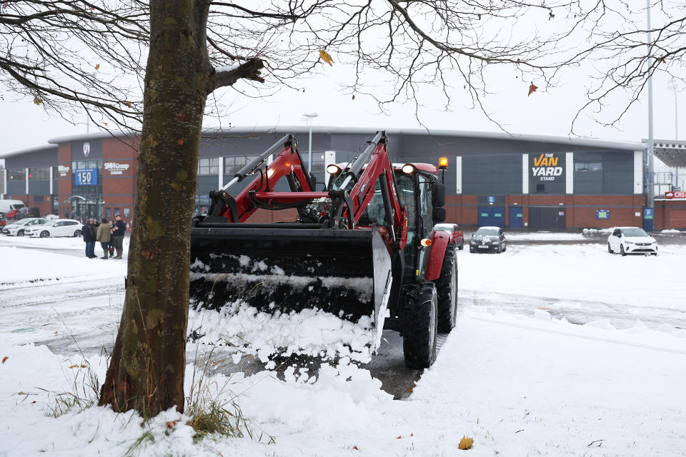 CHESTERFIELD, ENGLAND - DECEMBER 03: A tractor can be seen clearing snow prior to the Emirates FA Cup Second Round match between Chesterfield and Leyton Orient at Technique Stadium on December 03, 2023 in Chesterfield, England. (Photo by Catherine Ivill/Getty Images)