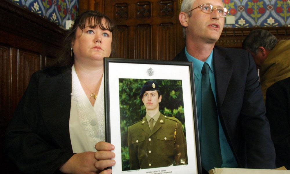 Diane and Geoff Gray with a photo of their dead son Private Geoff Gray who died at Deepcut barracks in 2001.