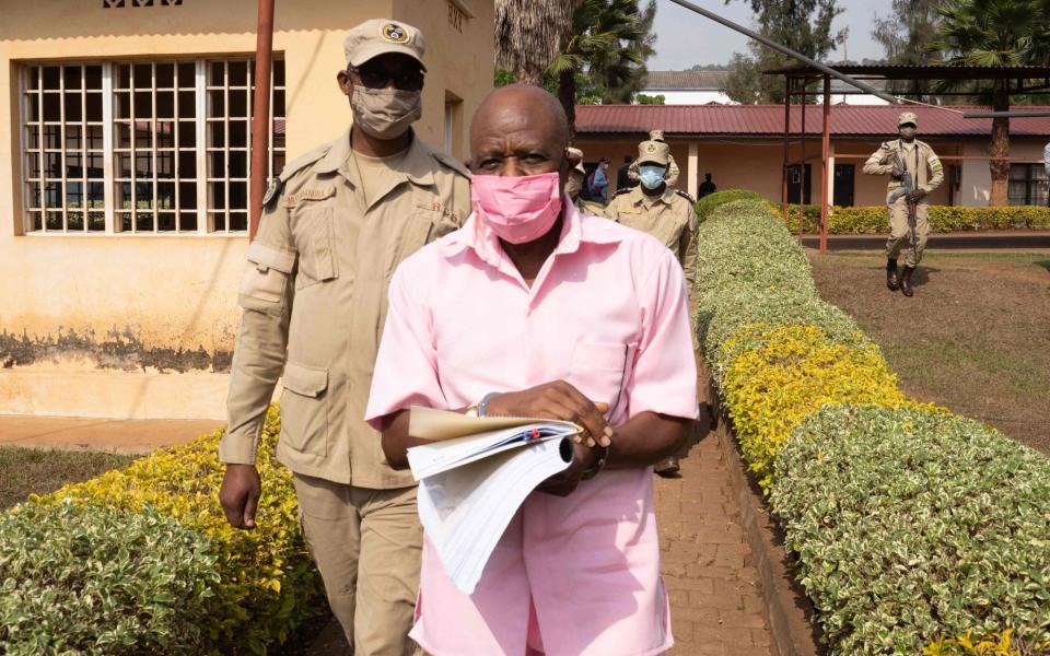  "Hotel Rwanda" hero Paul Rusesabagina in his pink inmate's uniform - SIMON WOHLFAHRT/AFP via Getty Images