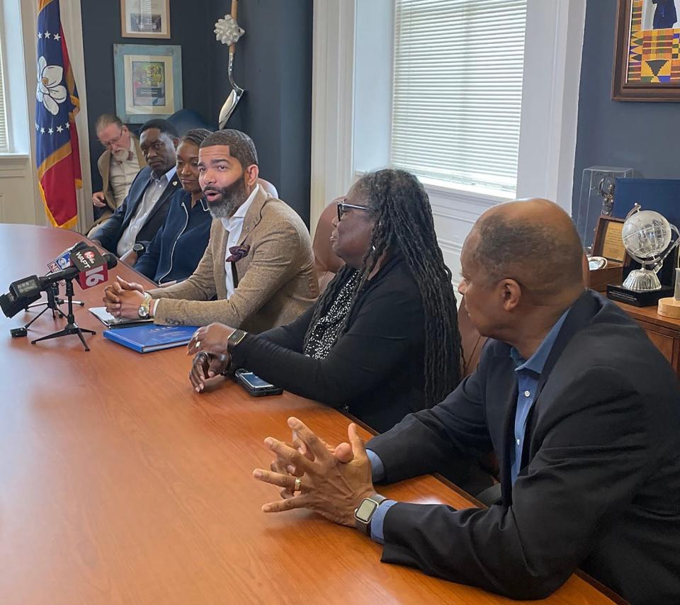 Jackson Mayor Chokwe Antar Lumumba sits with his administration at City Hall on Nov. 9, 2023 to announce he will be issuing a request for proposals for a new garbage collection service in 2024.