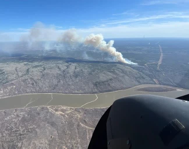 This photo shows a wildfire burning near Fort McMurray at 3:30 p.m. on May 10.  (Alberta Wildfire - image credit)