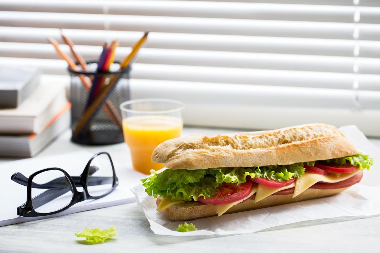 sub sandwich at office desk