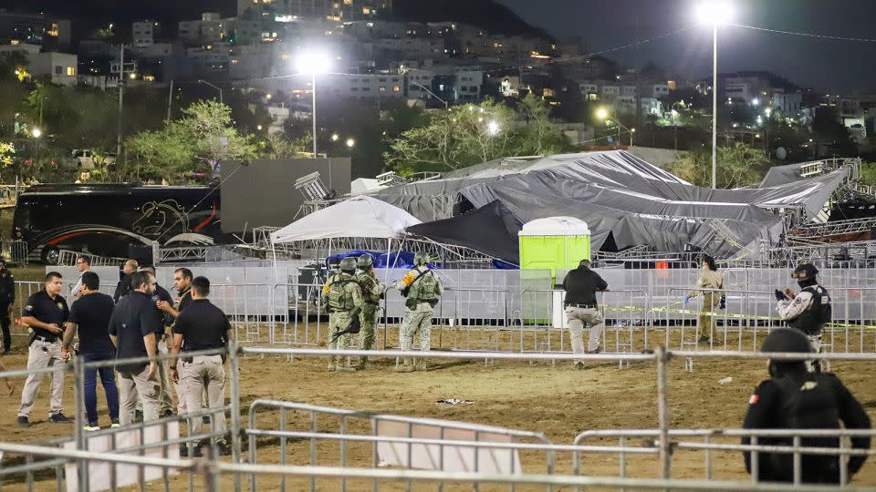 Security forces stand around a stage that collapsed due to a gust of wind during an event attended by presidential candidate Jorge Álvarez Máynez in San Pedro Garza García, on May 22, 2024. - Alberto Lopez/AP