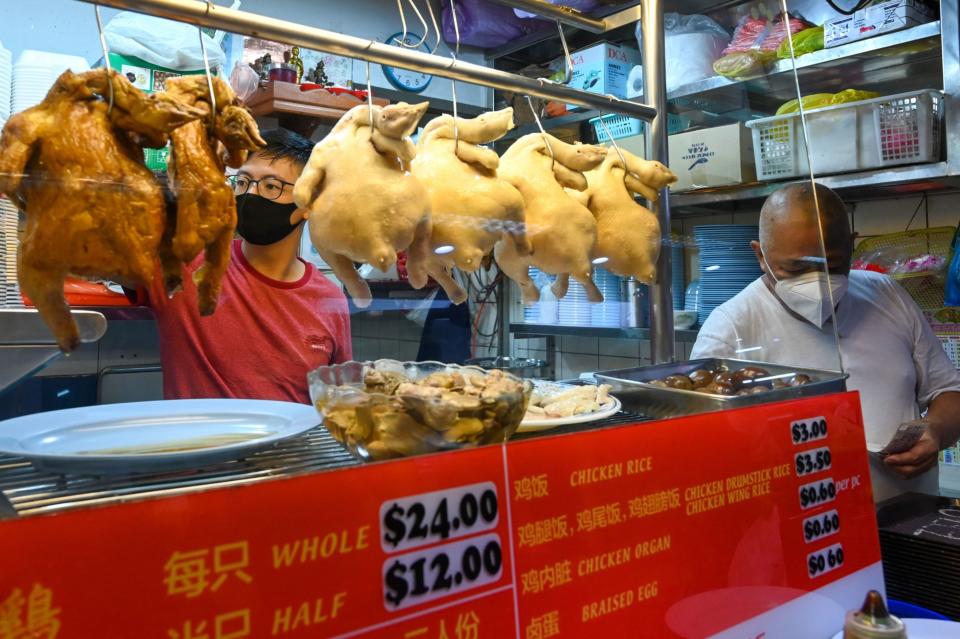 Hawker at a chicken rice stall in Singapore. (Roslan Rahman/AFP/Getty Images)