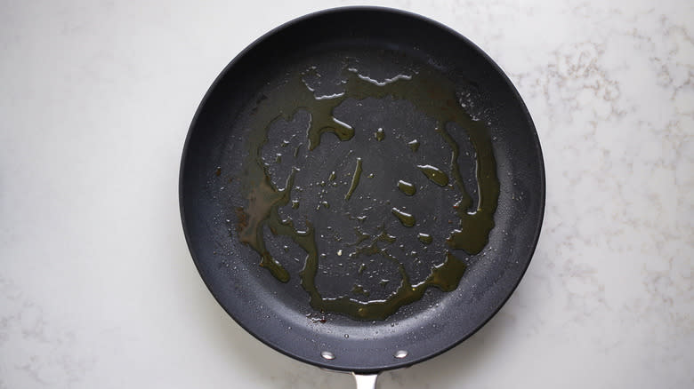 oil in black frying pan