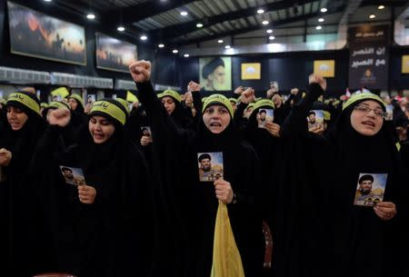 Supporters of Lebanon's Hezbollah leader Sayyed Hassan Nasrallah chant slogans and gesture during a rally marking Al-Quds day in Beirut's southern suburbs, Lebanon June 23, 2017. REUTERS/Aziz Taher