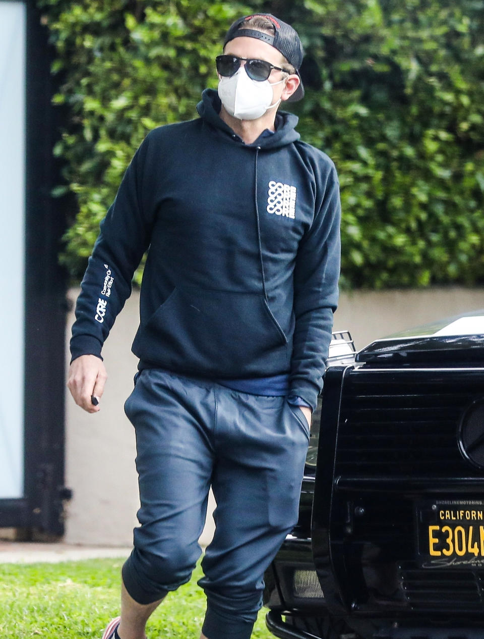 <p>Bradley Cooper wears a sweatshirt and joggers after a workout session at a private gym in Santa Monica on Wednesday.</p>